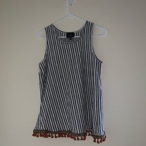 Women’s black and white striped top with pattered end